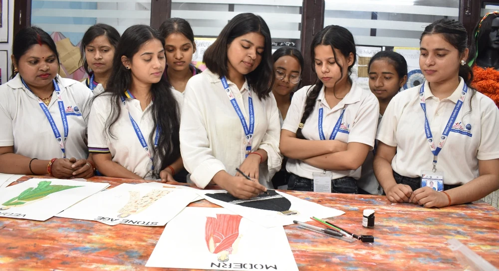 Wisdom College students learning in a hands-on design workshop